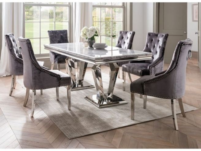 Silver grey dining table and outlet chairs